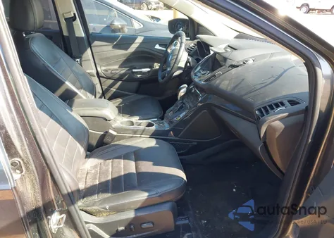 2016 Ford Escape Titanium z USA, uszkodzony, nr VIN 1FMCU9J97GUC20513